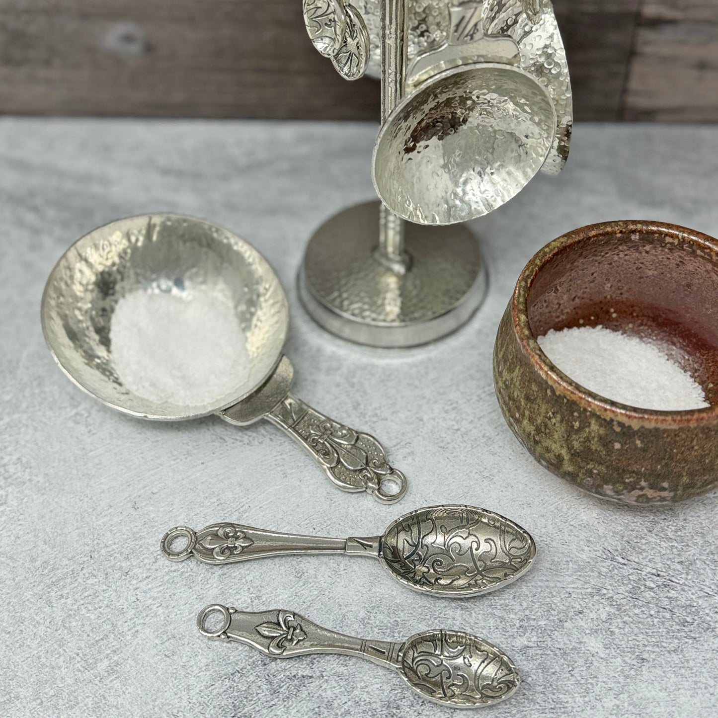 Crosby & Taylor Fleur de Lys Pewter Measuring Cups and Spoons with Compact Display Post, 9-piece Set, Handmade in the USA