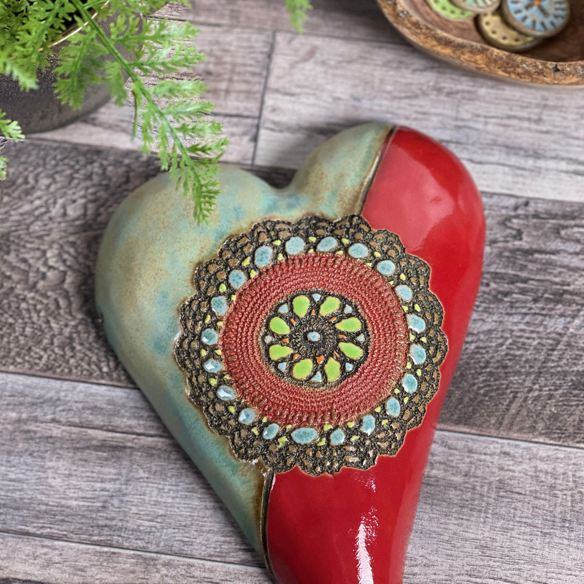 Cirque Medallion Ceramic Wall Heart in Red by Laurie Pollpeter Eskenazi