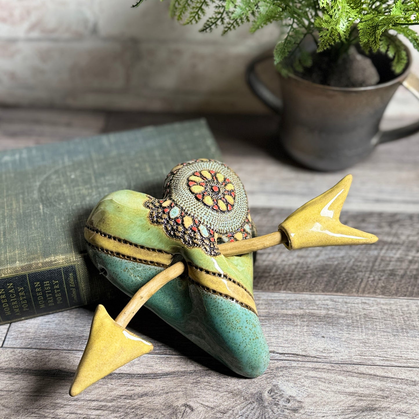 Little Jester Yellow Stripe with Arrow Ceramic Heart Wall Plaque by Laurie Pollpeter Eskenazi
