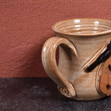 MudWorks Pottery Raven with Carved Pumpkin Mug, Sandstone